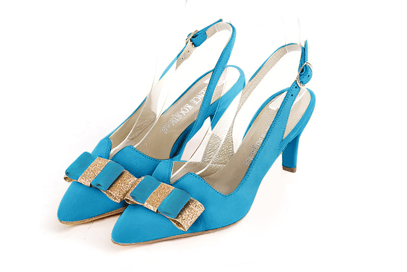 Turquoise blue and gold women's open back shoes, with a knot. Tapered toe. Medium slim heel. Front view - Florence KOOIJMAN